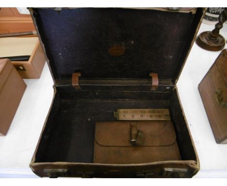 A VINTAGE LEATHER CASE, WALLET AND WOODEN RULER