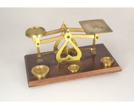 POSTAL SCALES.
A set of postal scales with three weights.