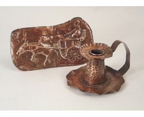 COPPER WARE.
A Charles Eustace Hayle, handmade copper chamber stick, height 7cm & an embossed copper decoration.