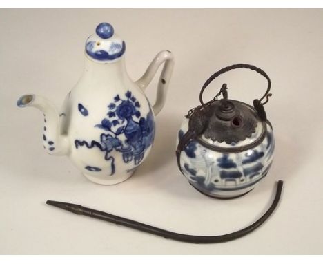 OPIUM VESSEL ETC.
A Chinese porcelain, metal mounted opium vessel with pipe & a Chinese porcelain spouted pot, height 15cm.