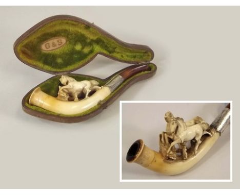 MEERSCHAUM.
A twin, horse carved Meerschaum pipe, with amber mouthpiece, by G & S, in fitted case.