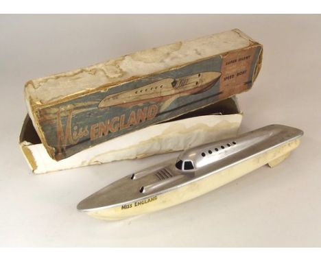 TIN PLATE SPEEDBOAT.
A Miss England tin plate & aluminium speedboat, in original box. (No leaflet)