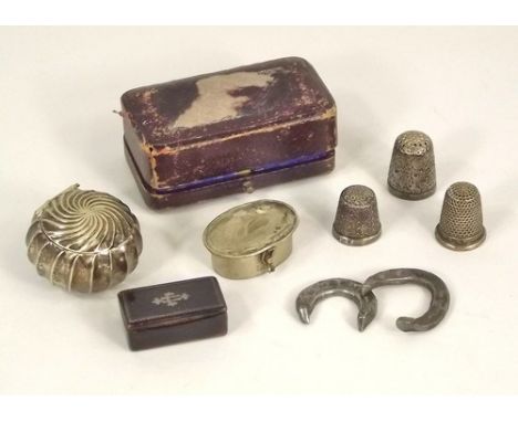 MISCELLANEOUS.
A papier mache lady's snuff box, silver thimbles, boxes etc.