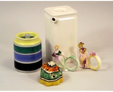 CLARICE CLIFF ETC.
A Wilkinson flower brick, possibly Clarice Cliff, a Grimwades 1945 Cube coffee pot, a Grays store jar & tw