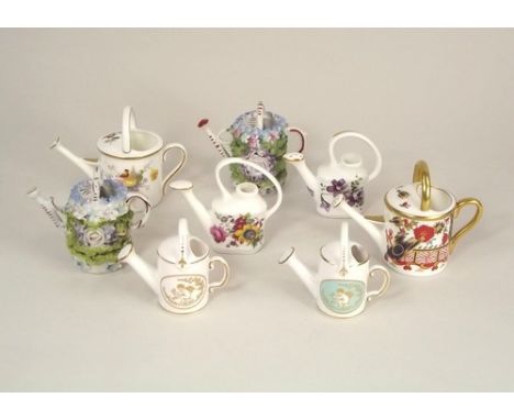 WATERING CANS.
Eight various miniature watering cans, including Royal Crown Derby, Spode, Hammersley etc.