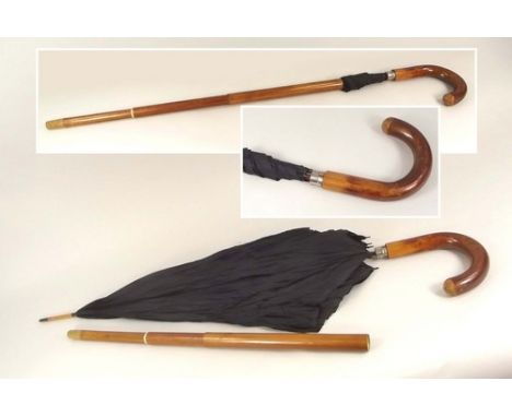 WALKING STICK/UMBRELLA.
A gentleman's Malacca walking stick/umbrella, with collapsible shaft.