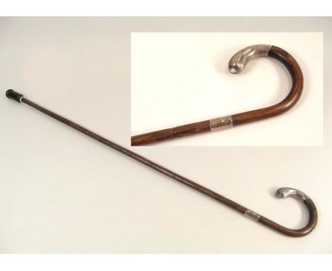 WALKING STICK.
A lady's silver mounted, partridge bamboo walking stick.