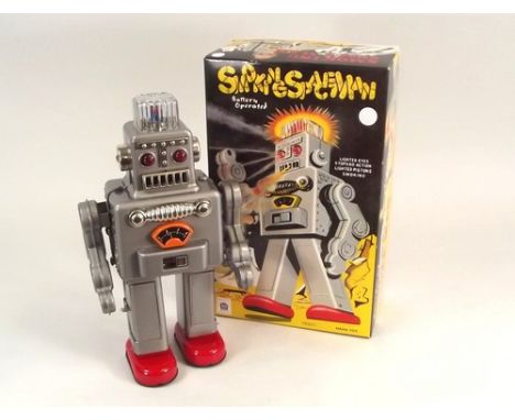 ROBOT.
A boxed, tin-plate & plastic, battery operated 'Smoking Spaceman' robot. A collectors re-issue, after an original c196
