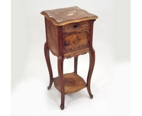 FRENCH COMMODE.
A late 19th century French walnut bedside commode, with original ceramic liner, low shelf & red marble top.
H