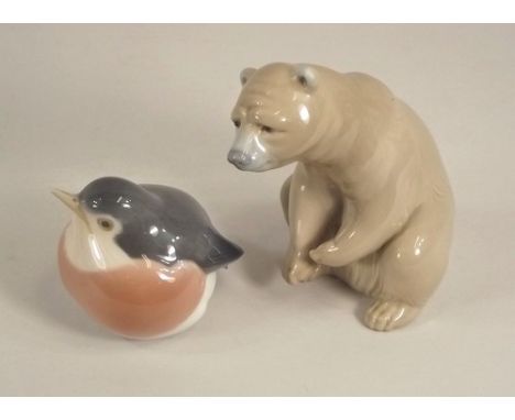 ROYAL COPENHAGEN & LLADRO.
A Royal Copenhagen model bird, No.2266 & a Lladro bear,height 11cm.