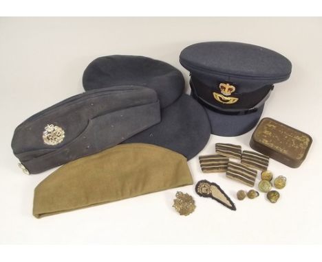 RAF HATS ETC.
A RAF officers cap, two berets, a side cap, badges, emergency rations tin etc., also, a Russian army side cap.