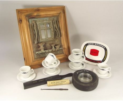 R.N.L.I. CHARITY LOT.
Advertising ashtrays, a button hook, cups & saucers & a framed pottery mirror.