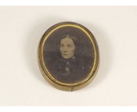 PORTRAIT AMBROTYPE.
A Victorian portrait ambrotype, set within a locket frame.
4 x 3.5cm.