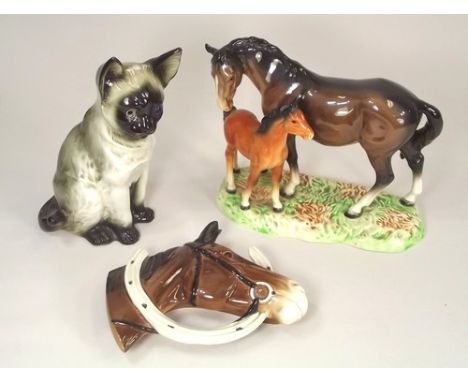 BESWICK ETC.
A Beswick mare & foal, No.953, a Beswick wall plaque, No.807 & a continental Siamese cat night light.