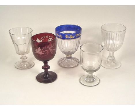 DRINKING GLASSES.
A 19th century ale glass, two moulded drinking glasses, a ruby stained & etched glass, etc.