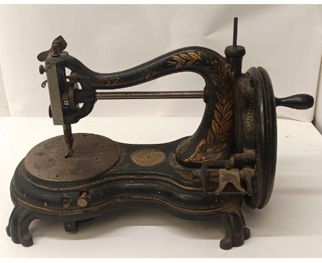 A Jones table top sewing machine, 34 cm wide  Provenance:&nbsp; A single owner collection, from the studio of a seamstress