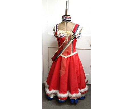 A vintage adjustable dress maker's mannequin, with a dress in French colours Provenance:&nbsp; A single owner collection, fro