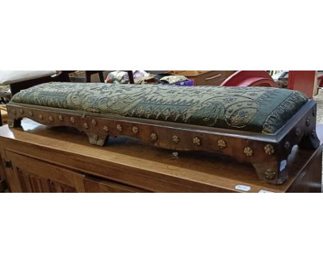 A 19th century footstool, with a beadwork top, 124 cm wide