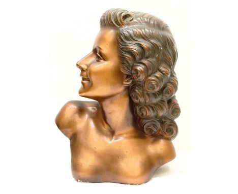 A plaster bust of a woman, 40 cm high  Provenance:&nbsp; A single owner collection, from the studio of a seamstress