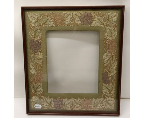 After William Morris, an embroidered frame surround, 45 x 38 cmRear of the frame worn with some losses, no chips or cracks to