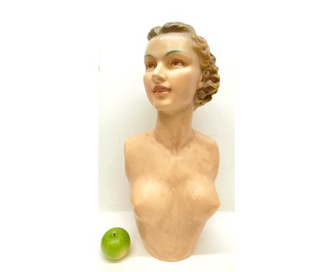 A mid-20th century plaster bust of a woman, 60 cm high&nbsp; Provenance:&nbsp; A single owner collection, from the studio of 