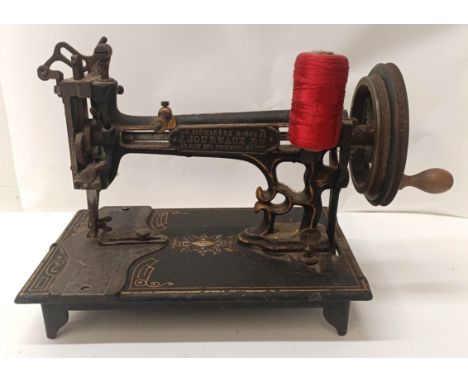 A J Journaux table top sewing machine, 27 cm wide Provenance:&nbsp; A single owner collection, from the studio of a seamstres