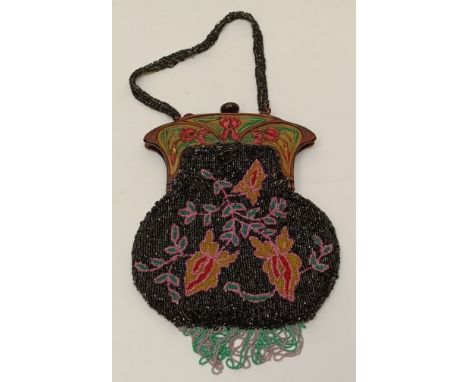 A French Art Nouveau style beaded bag, a stole and matching jewellery