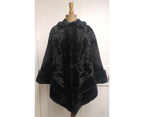 A black velvet and beadwork shawl, with a fur lining&nbsp; Provenance:&nbsp; A single owner collection, from the studio of a 