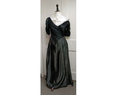 A vintage female mannequin, in a black dress Provenance:&nbsp; A single owner collection, from the studio of a seamstress