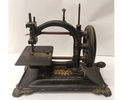 A D Bacle, Paris table top sewing machine, 28 cm wide Provenance:&nbsp; A single owner collection, from the studio of a seams