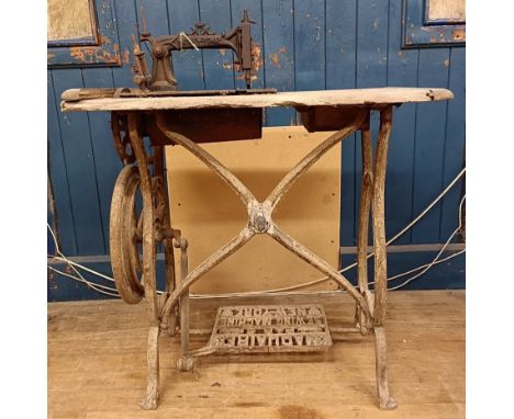 A R Maquaire 2 sewing machine, on an iron treadle base, barn stored, 63 cm wide Provenance:&nbsp; A single owner collection, 