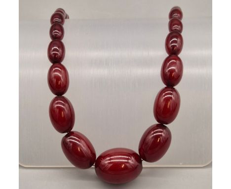 Vintage Cherry Amber Graduating bead necklace. 49.79grams. 