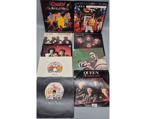 A Collection of Ten Queen LP's Records; A Kind Of Magic, A Day At The Races, A Night at the Opera, Radio GAGA, The Works, Que