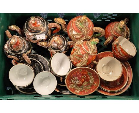 A Crate of two Satsuma Dragon pattern tea services; Tea Pots, sugar pots, milk jugs &amp; cup n Saucers
