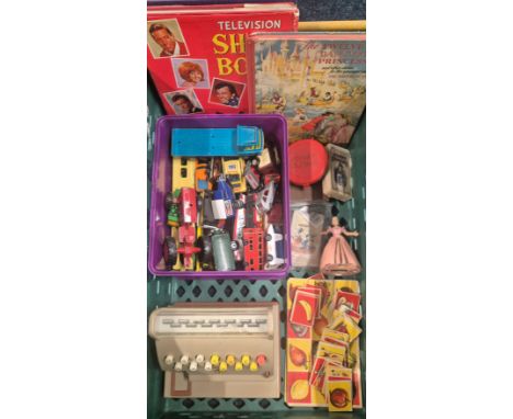 A Crate of collectable toys; vintage clockwork fairy figure, Cadon cash register, Playworn vehicles, The Twelve dancing princ