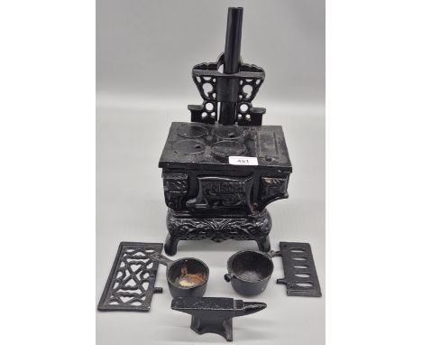A Vintage salesman advertising Cast iron small Aga Cooker &amp; small pots together with Cast Iron Desk tidy Anvil 