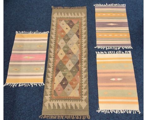 Hand knotted kilim runner rug in a green ground and three smaller hand made rugs. Runner- 200x70cm 