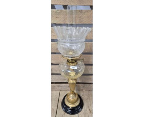 19th century desk top oil burner lamp. Brass and glass. [67cm high] 