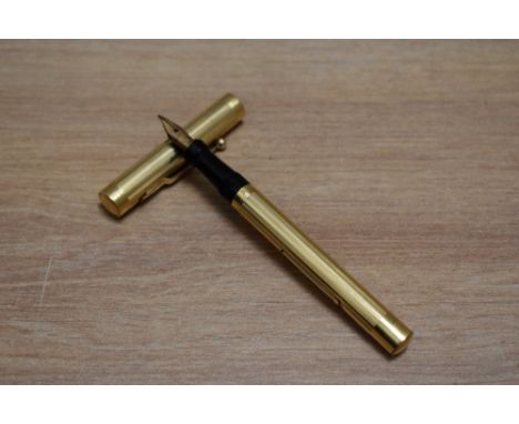 A Mabie Todd Self Filling lever fill fountain pen in yellow metal in engine turned reeded design having Swan 2 14ct nib