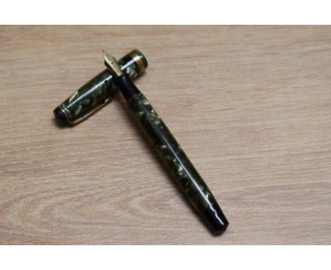 A Parker Televisor Junior button fill fountain pen in green marble with broad band to the cap having Parker 14Ct W nib. Boxed