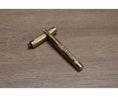 A Mabie Todd &amp; Co Swan lever fill fountain pen in engine turned gold with ring top cap having Mabie Todd &amp; Co NY 1 ni