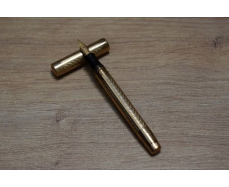 A Mabie Todd &amp; Co Swan leverless twist fill fountain pen in engine turned 9ct gold having Swan 2H 14CT 585 England nib.