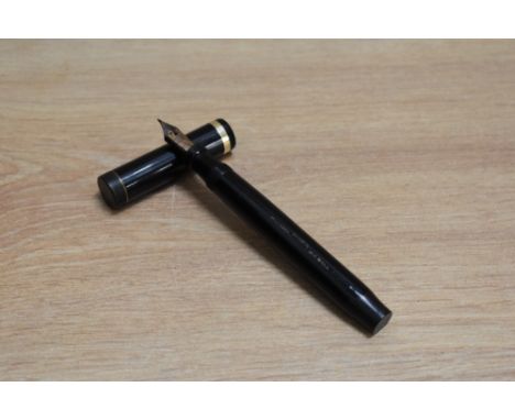 A Parker Duofold Senior button fill fountain pen in black with single band to the cap having Parker Duofold 0152598 made in U