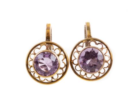PAIR OF AMETHYST SCREWBACK EARRINGS, set with round faceted amethysts to an openwork mount, with fittings for non-pierced ear