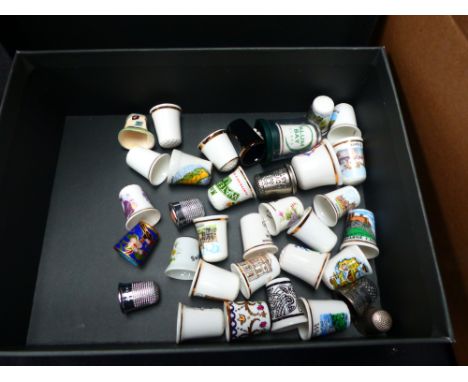 Box of mixed ceramic thimbles