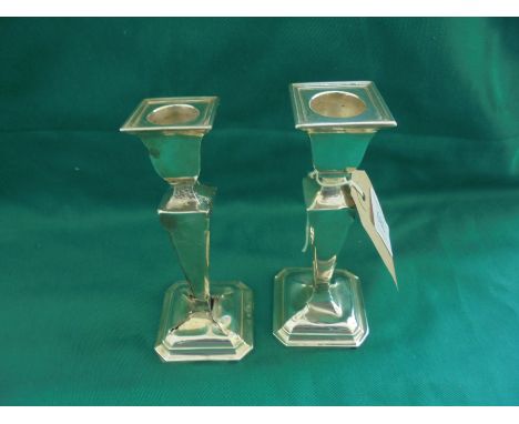 Pair of early 20th century silver candlesticks, 1 stick damaged, 5.79oz in total, Birmingham 1916