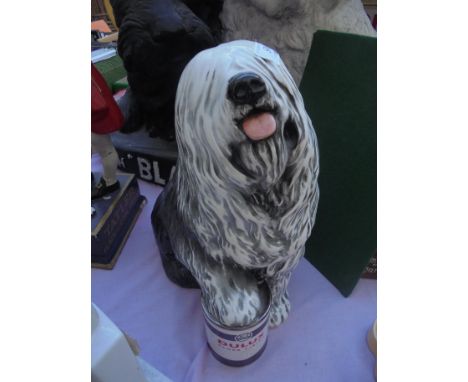 Superb ceramic Olds English Sheepdog for Dulux with paw on tin of paint stating 'Dulux Gloss Finish', this is a large item