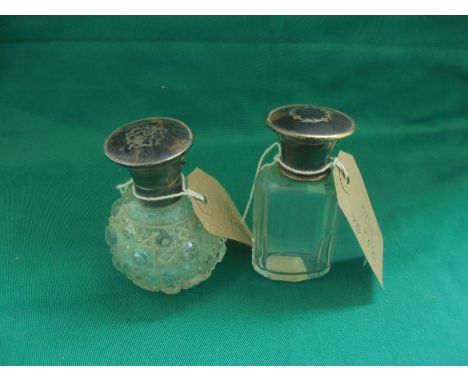 Pair of glass perfume containers with silver and tortoiseshell tops