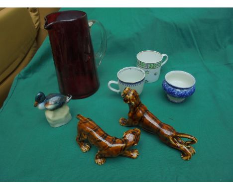 Magpie box containing cranberry jug with handle, ceramic coffee can,  Chinese cup and bowl, 2 model treacle glazed Tigers and
