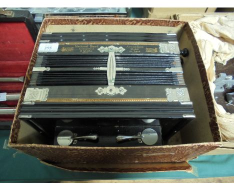 In original box National Band Accordion Deluxe model in good condition, early 20th century